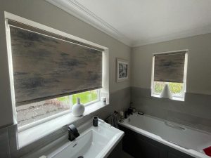 image of roller blinds fitted in a contemporary bathroom